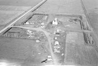 Aerial photograph of a farm in Saskatchewan (32-41-22-W3)