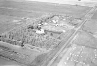 Aerial photograph of a farm in Saskatchewan (10-41-22-W3)