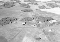 Aerial photograph of a farm in Saskatchewan (10-42-13-W3)