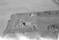 Aerial photograph of a farm in Saskatchewan (28-42-13-W3)