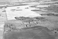 Aerial photograph of a farm in Saskatchewan (36-42-14-W3)