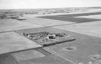 Aerial photograph of a farm in Saskatchewan (28-42-14-W3)