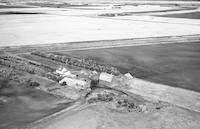 Aerial photograph of a farm in Saskatchewan (42-14-W3)