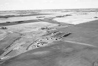 Aerial photograph of a farm in Saskatchewan (27-42-14-W3)