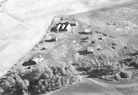 Aerial photograph of a farm in Saskatchewan (22-42-14-W3)