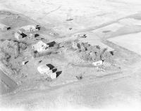 Aerial photograph of a farm in Saskatchewan (24-42-14-W3)
