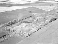 Aerial photograph of a farm in Saskatchewan (13-42-14-W3)