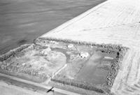 Aerial photograph of a farm in Saskatchewan (42-14-W3)