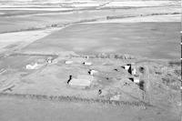 Aerial photograph of a farm in Saskatchewan (31-42-18-W3)