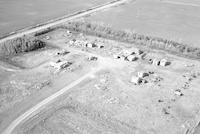 Aerial photograph of a farm in Saskatchewan (12-20-W3)