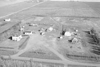 Aerial photograph of a farm near Phippen, SK (42-21-W3)