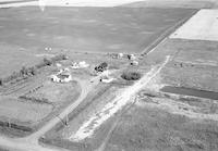 Aerial photograph of a farm in Saskatchewan (42-21-W3)