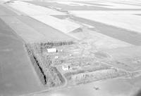 Aerial photograph of a farm in Saskatchewan (6-42-21-W3)