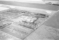 Aerial photograph of a farm in Saskatchewan (6-42-21-W3)