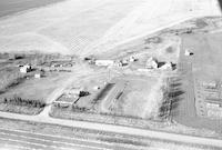 Aerial photograph of a farm in Saskatchewan (26-42-21-W3)