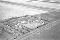 Aerial photograph of a farm in Saskatchewan (42-22-W3)