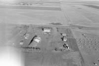 Aerial photograph of a farm in Saskatchewan (36-42-22-W3)