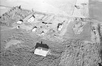 Aerial photograph of a farm in Saskatchewan (27-42-22-W3)