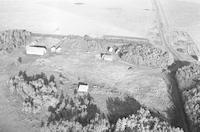 Aerial photograph of a farm in Saskatchewan (15-42-22-W3)