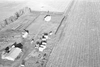 Aerial photograph of a farm in Saskatchewan (16-42-22-W3)