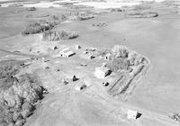 Aerial photograph of a farm in Saskatchewan (43-12-W3)