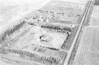 Aerial photograph of a farm near Richard, SK (14-43-12-W3)