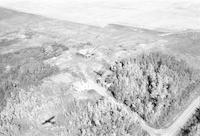 Aerial photograph of a farm near Richard, SK (15-43-12-W3)