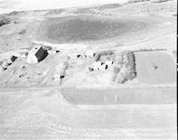 Aerial photograph of a farm near Richard, SK (16-43-12-W3)