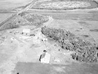 Aerial photograph of a farm in Saskatchewan (43-13-W3)