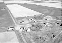 Aerial photograph of a farm in Saskatchewan (43-13-W3)