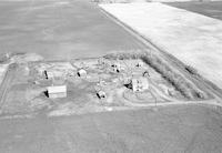 Aerial photograph of a farm near Lilac, SK (43-13-W3)