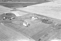 Aerial photograph of a farm in Saskatchewan (43-13-W3)