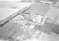 Aerial photograph of a farm near Lilac, SK (43-13-W3)