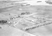 Aerial photograph of a farm in Saskatchewan (43-13-W3)