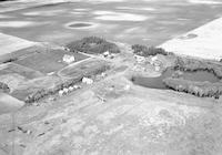 Aerial photograph of a farm in Saskatchewan (32-44-15-W3)