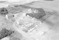 Aerial photograph of a farm in Saskatchewan (44-16-W3)