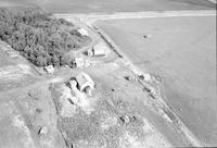 Aerial photograph of a farm in Saskatchewan (44-16-W3)