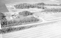 Aerial photograph of a farm in Saskatchewan (26-44-16-W3)