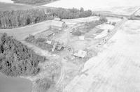 Aerial photograph of a farm in Saskatchewan (36-44-16-W3)