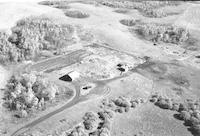 Aerial photograph of a farm in Saskatchewan (11-44-14-W3)
