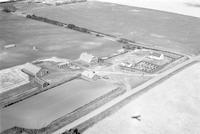 Aerial photograph of a farm in Saskatchewan (44-15-W3)