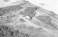 Aerial photograph of a farm in Saskatchewan (44-15-W3)