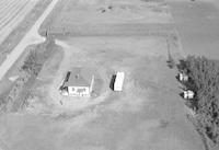 Aerial photograph of a farm in Saskatchewan (16-44-15-W3)