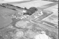 Aerial photograph of a farm in Saskatchewan (21-44-15-W3)