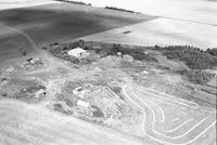 Aerial photograph of a farm in Saskatchewan (30-44-15-W3)
