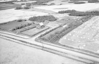 Aerial photograph of a farm in Saskatchewan (28-44-16-W3)