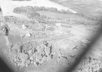 Aerial photograph of a farm in Saskatchewan (45-15-W3)