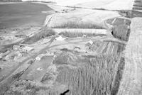 Aerial photograph of a farm in Saskatchewan (23-45-15-W3)