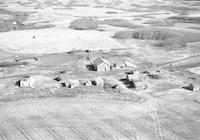 Aerial photograph of a farm in Saskatchewan (24-45-15-W3)