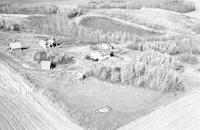 Aerial photograph of a farm in Saskatchewan (23-45-15-W3)